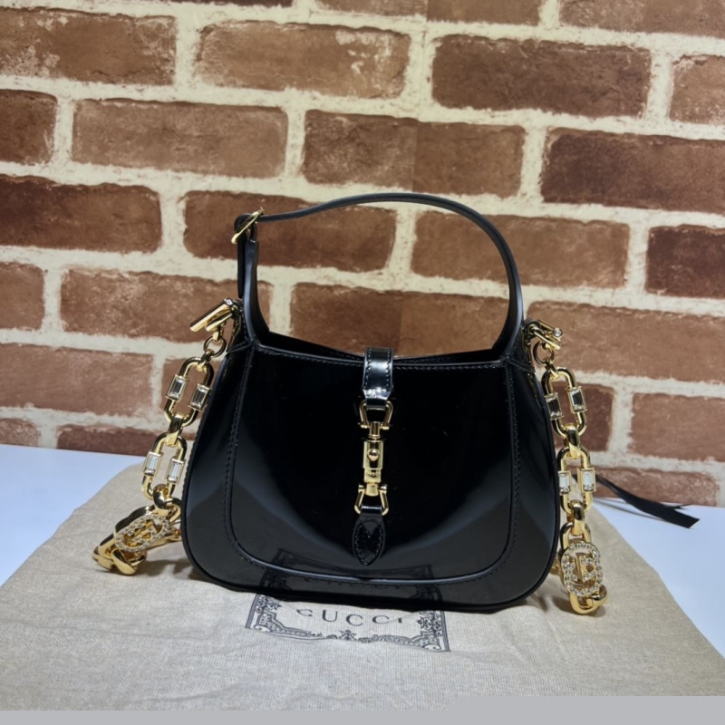 G*u*i top handle bags